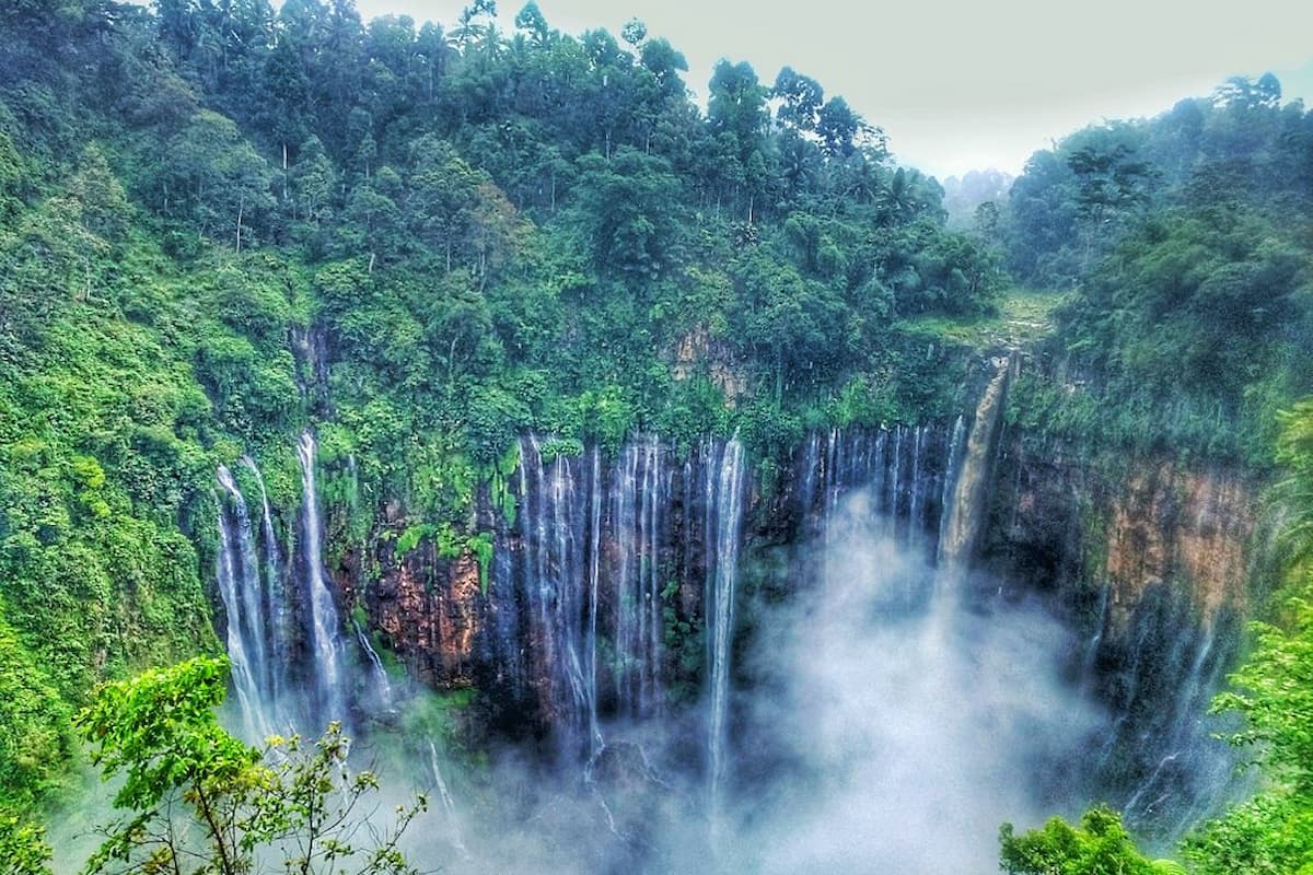 Trekking to Coban Sewu Waterfall